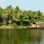 The beautiful hideaway island Kumarakom is off the coast of Kerala, India. It becomes the ideal vacation spot for unwinding thanks to the serenity of its backwaters and the charming backdrop of the town.